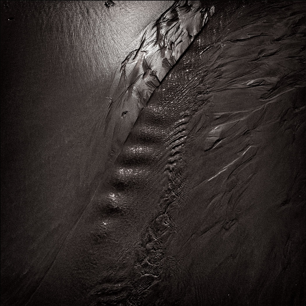 Photographie numérique déssaturée du sable