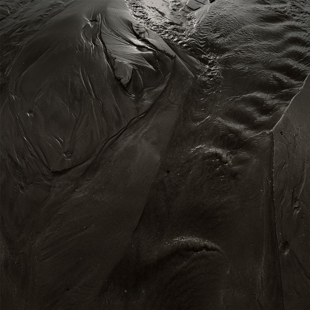 Photographie numérique déssaturée et détaillé du sable à Ault
